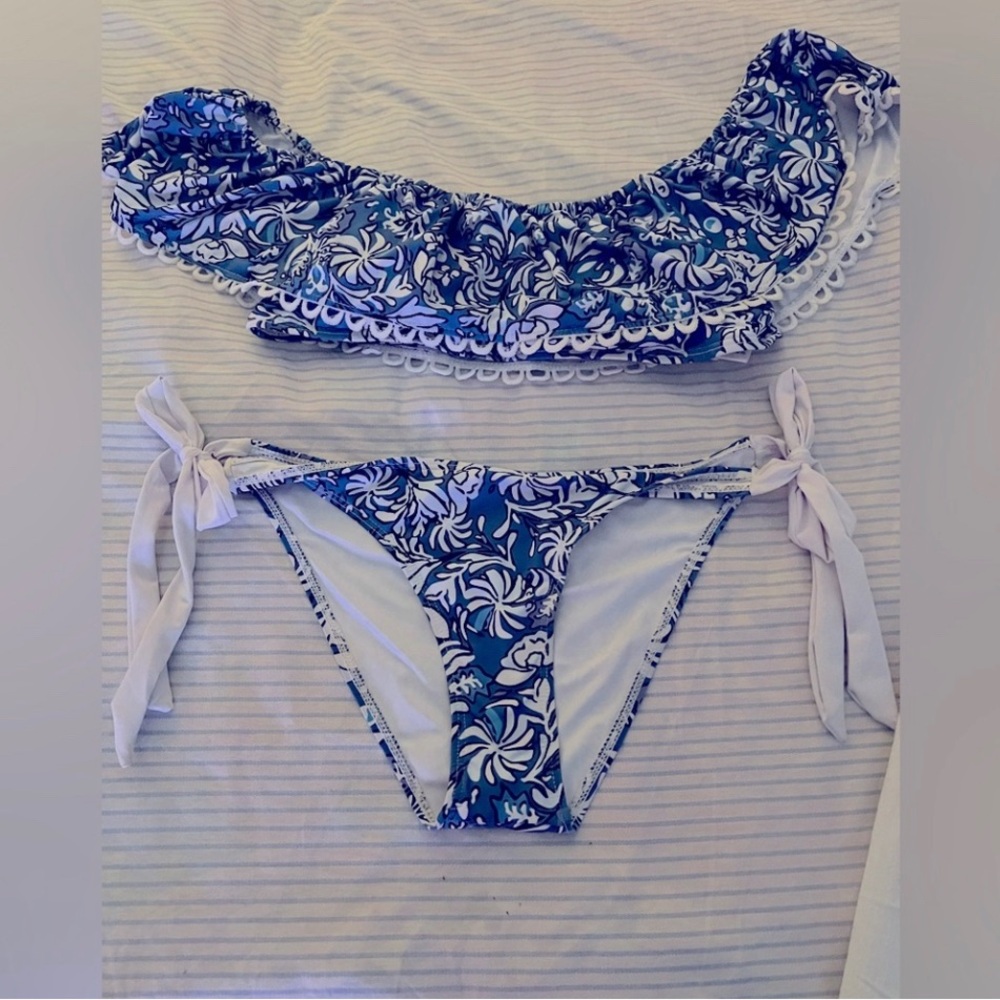 2 Great swimsuits Victoria Secret top & adjustable white bottoms, & 2 suit